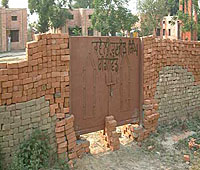 A view of the encroachment on prime land of the old power house of the Punjab State Electricity Board on the Amritsar-Lahore road