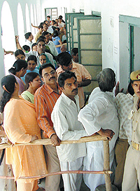 Voters in a queue to cast their vote