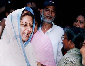 Veteran actress and Congress candidate from Kolkata North-East constituency Mousumi Chatterjee interacts with voters