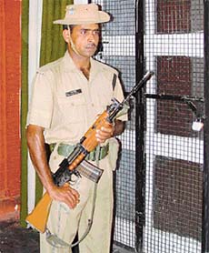 An ITBP personnel stands guard at the Sector 11 counting centre in Chandigarh