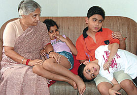 Delhi Chief Minister Sheila Dikshit playing with her grand-children after a gruelling schedule for the elections in the Capital on Tuesday.