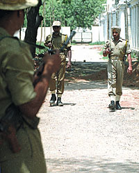 Security personnel keeping vigil at Mandir Marg counting centre in the Capital 