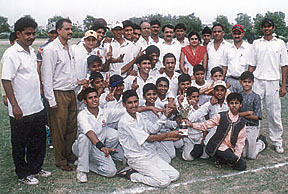 Government School, Jheel Khuranja with the Sushila Tiwari Under-17 Cricket Tournament trophy.