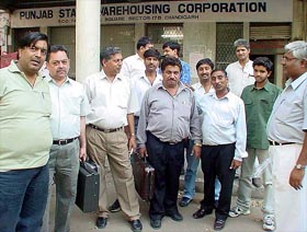 A group of traders, who had come to deposit their applications for the procurement of wheat, outside the Sector 17 office of the Punjab State Warehousing Corporation, Chandigarh.&nbsp;