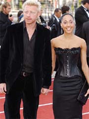 German tennis player Boris Becker arrives with an unidentified companion to the Laureus World Sports awards ceremony