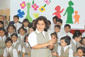 A student performs during a talent hunt competition organised by Srijan at Sri Guru Harkrishan Model School in Chandigarh