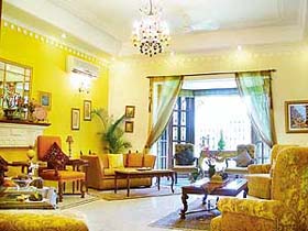 The drawing room has four separate sitting arrangements