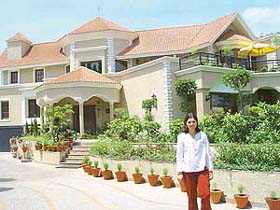 The facade is adobe in look with an American design