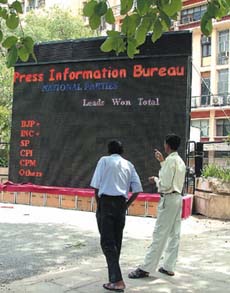 The Press Information Bureau has set up a board to display the election results outside Shastri Bhawan in the Capital. 