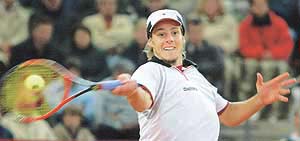 Gaston Gaudio of Argentina hits a forehand to Swiss Roger Federer at the Hamburg Masters Tennis tournament