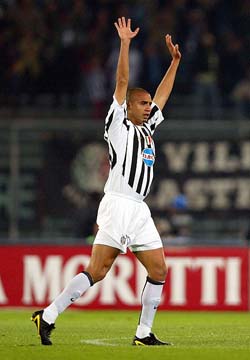 Juventus' French striker David Trezeguet celebrates after scoring against Lazio during their Italian Cup final second leg match