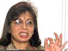 Biocon chairperson Kiran Majumdar Shaw gestures during a news conference in Bangalore on Friday.