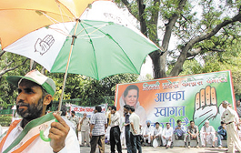 A party worker outside 10 Janpath in the Capital on Friday. 