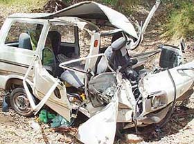 The mangled remains of a Maruti van that fell into a dry rivulet near Sahora village on the Kurali-Kharar highway