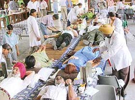 Volunteers donate blood at a camp organised by St John�s Old Boys Association (SJOBA) at St John�s School in Sector 26, Chandigarh