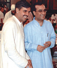 East Delhi MP Sandeep Dikshit with New Delhi MP Ajay Maken at Parliament House in the Capital on Saturday