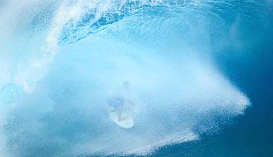 Former world champion CJ Hobgood of the US scores a victory over Richie Lovett of Australia 