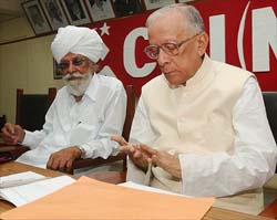 CPM General Secretary Harkishen Singh Surjeet and former West Bengal Chief Minister Jyoti Basu during the party's Central Committee meeting