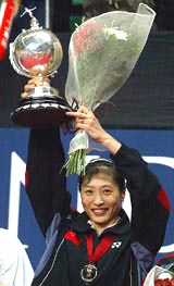 China's Zhang Ning holds the Uber Cup after she won the final at Istora Senayan stadium in Jakarta 