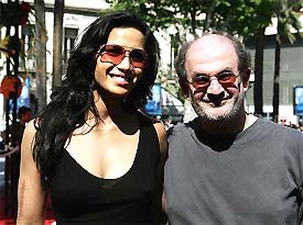 British author Salmon Rushdie escorts his wife Padma Lakshmi for the screening of Argentine director Lucrecia Martel's film La Nina Santa
