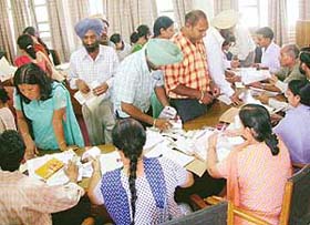 Candidates submit application forms for the B.Ed entrance examination at the Government College of Education, Sector 20, Chandigarh