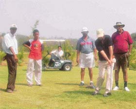 Golfers take part in the Summer Golf Tournament at Forest Hill Resort, near Chandigarh
