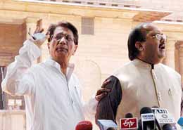 Rashtriya Lok Dal President Ajit Singh and Samajwadi Party General Secretary Amar Singh address the media 