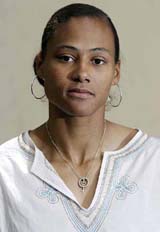 Marion Jones poses during the Olympic Media Summit in New York on Sunday. Jones would go to court if the US Anti-Doping Agency bars her from competing in the Athens Olympics without a positive drug test