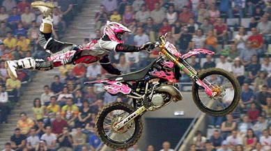 Spanish competitor Edgar Torronteras performs a seat grab Indian air during the Freestyle International Jumps Event at the Sant Jordi Stadium in Barcelona 