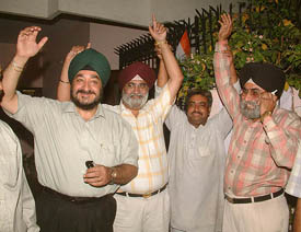 Family members of Dr Manmohan Singh�s brother and other relatives perform bhangra on his appointment as the Prime Minister
