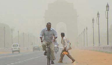 A thick haze enveloped the city sending people scurrying for cover on Thursday also