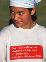 Afghan athlete Rubeena Akimgar looks on during the session of training at a Stadium in Kabul, Afghanistan