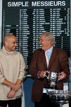 USA's Andre Agassi smiles at Christian Bimes