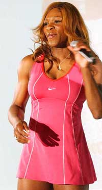 US tennis player Serena Williams gestures during a news conference in Paris