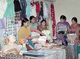 Final year students of the International Polytechnic for Women display their creations during the annual exhibition in Chandigarh on Monday.