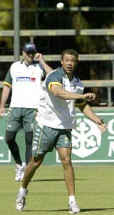 Australia�s Andrew Symond throws the ball during a practice session at Harare Sports Club