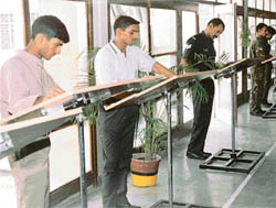 Outdoor patients browse through newspapers at the Command Hospital, Chandimandir.