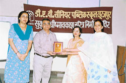 The Principal of Hansraj Public School, Mr Vijay Kumar, being felicitated at DAV Senior Public School, Surajpur, on Tuesday.
