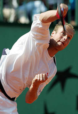 Martin Verkerk of the Netherlands serves during his match against Julien Boutter of France