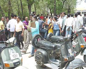 Candidates return from examination centre after taking PMT of HP University at Hamirpur
