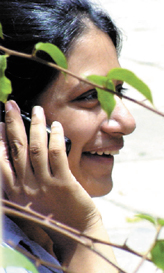 A student of Jesus and Marry School giving the good news to her parents after the declaration of the CBSE class XII examination results.
