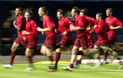 Belgian international players run during a training session of the national squad in Kraainem