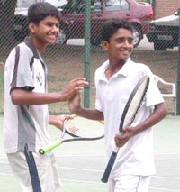 Mandeep Yadav and his partner Gurmohit in a happy mood after winning their doubles tie at the AITA Talent Series Tennis meet here on Thursday. 