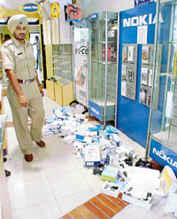 A mobile company's shop in Sector 35, Chandigarh, where mobile sets were stolen second time in the last few days.