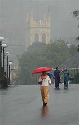 People enjoying the rain at Shimla