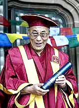 The Dalai Lama receives an honorary fellowship from Liverpool John Moores University at Liverpool Cathedral on Thursday