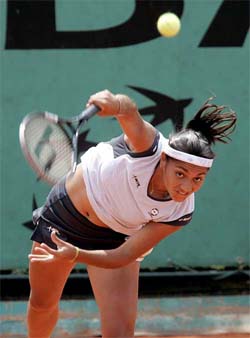 Paola Suarez of Argentinia serves during her match against Tatiana Perebiynis of Ukraine