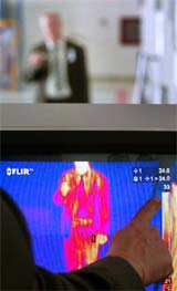 Bulgarian Health Ministry official displays the new infrared termographic camera