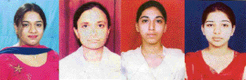 Shilpa Ahuja(I), Isha Gupta(6), Indesh Kaur (8), and Dolly Sharma (9) of Khalsa College for Women who topped in the Panjab University B.Com II examinations.