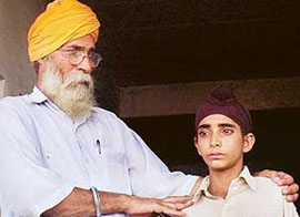 Granthi Hardev Singh with his son Jaskirat